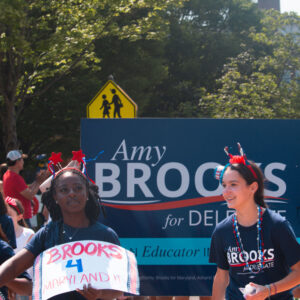 Group of supporters carrying a Brooks for Delegate sign