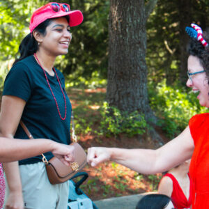 Amy fist bumping a constituent