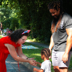 Amy Brooks saying hi to a kid