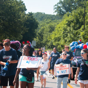 Group of Supporters marching in teh parade in Brooks for Maryland shirts