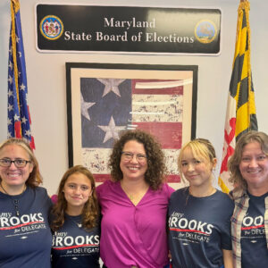 Amy Brooks with fellow supporters wearing Amy Brooks for Delegate shirts.